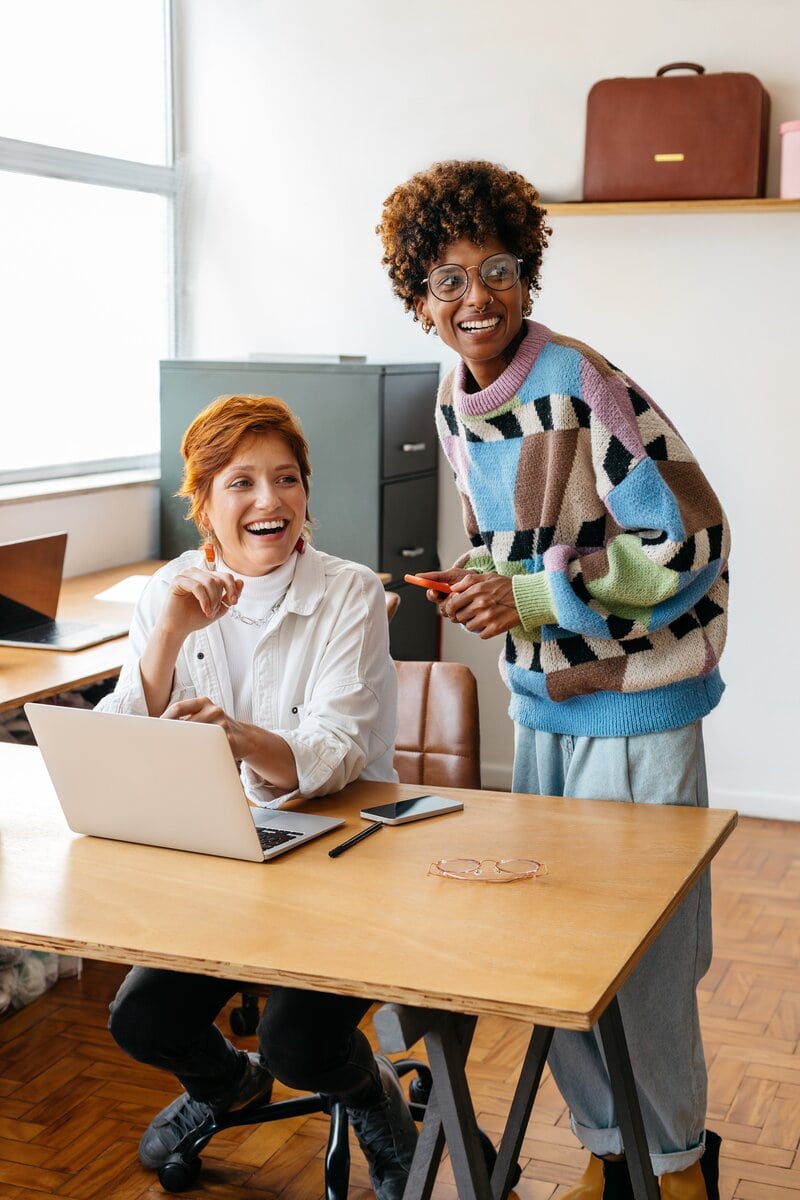 Diverse colleagues collaborating in modern co working space